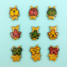 Korogu brooches