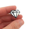 Iridescent and black graphic diamond pin badge