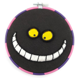 Broderie Chat du Cheshire, avec un sourire phosphorescent