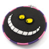 Cheshire Cat embroidery, with a phosphorescent smile