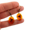 Mosquito in amber ovals dangle earrings