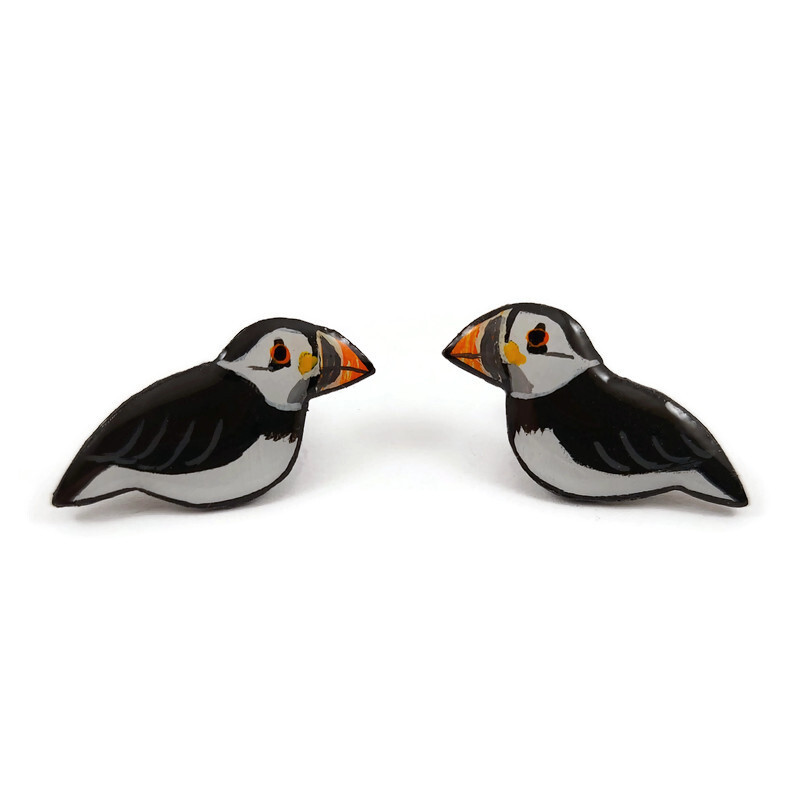 Atlantic puffins ear ships