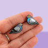Puces d'oreilles pigeons biset